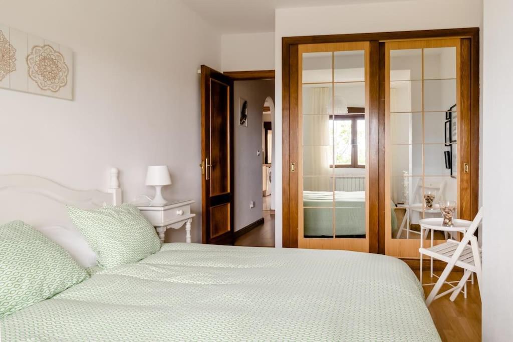 Casa De Las Flores - Apartamento Con Jardin Privado Frente A La Playa De Comillas Buitenkant foto