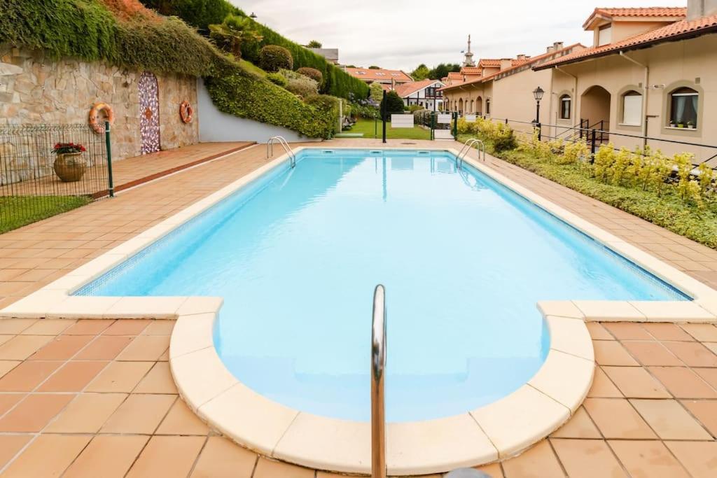 Casa De Las Flores - Apartamento Con Jardin Privado Frente A La Playa De Comillas Buitenkant foto