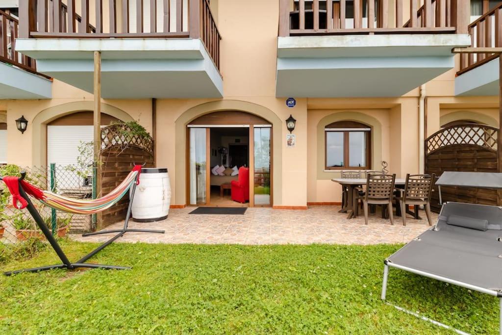 Casa De Las Flores - Apartamento Con Jardin Privado Frente A La Playa De Comillas Buitenkant foto