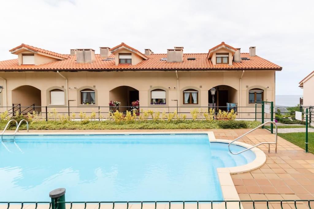 Casa De Las Flores - Apartamento Con Jardin Privado Frente A La Playa De Comillas Buitenkant foto
